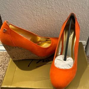 Never worn. Coral / Orange Size 8.5 wedge heels. CUTE!